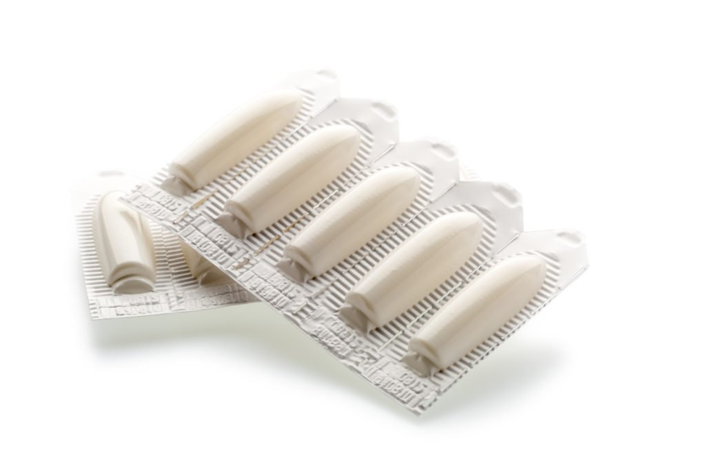 Photograph of suppositories for vaginal dryness in protective wrapping