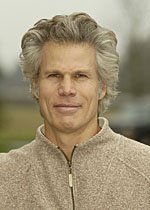 Headshot of Dr. David Shefrin, ND., creator of Nature's Naturopathic. The doctor is outdoors and wearing a light brown sweater.